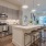 kitchen with an island and bar stools