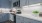 close up of a kitchen counter with stainless steel appliances