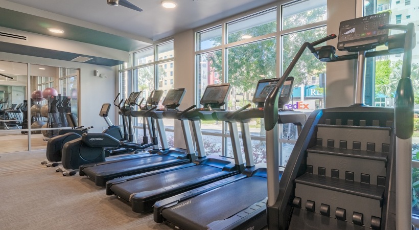 fitness center with exercise equipment