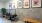a room with a machine, bench and chair