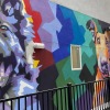 Mural of dogs at Legacy Encore