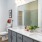 Bathroom with ample counter space and modern lighting in units at Legacy Encore