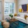 Open space living area with natural lighting and door to outdoor space at Legacy Encore