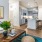 Open space living area with modern lighting in apartments at Legacy Encore